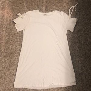 White dress with tied sleeves.